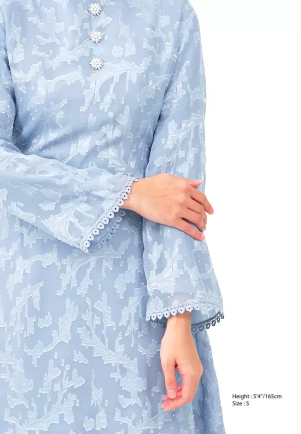 gene-martino-6141-8775854-5.jpg.webp Elegant Sky Blue Baju Kurung – Elegance Redefined